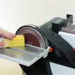 Cleaning abrasive belts